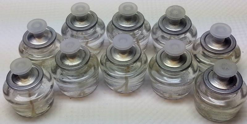lot 9186 image: 10 of the Sterno Products 30102 Soft Light 10 Hour Smokeless Clear candles.