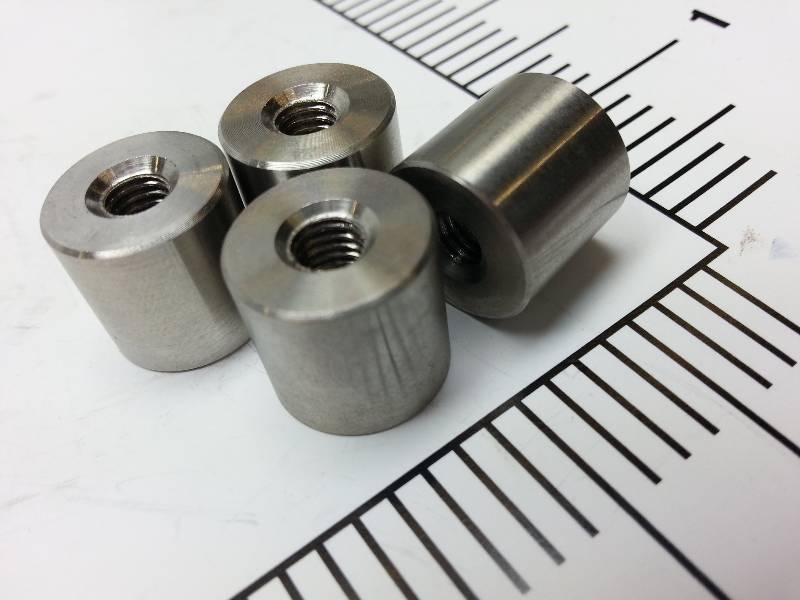 lot 9202 image: Set of 4 new 916 long 58 diameter with 10 MM threads thru threads spacers stand off button.
