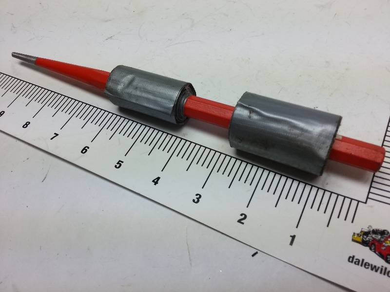 lot 8983 image: 10 inch tool drift punch with Duct tape handles to take care of the shock