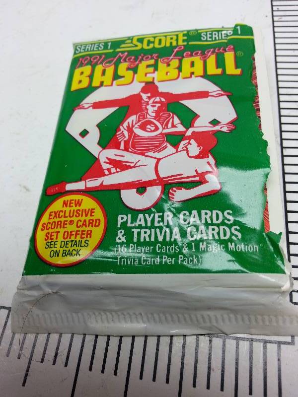 lot 8958-2 image: Put out by Score is this Series 1 1991 MLB baseball player cards & World Series trivia card too