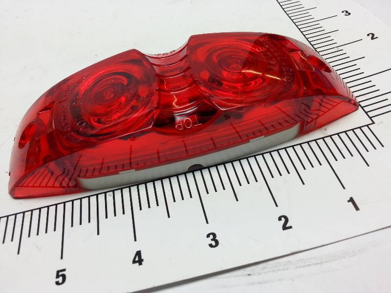 lot 8944 image: New Red trailer or truck clearance light assembly.  If youre is broken, dont let this get away.