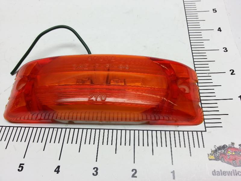 lot 8942 image: New amber trailer or truck clearance light assembly.  If youre is broken, dont let this get away.