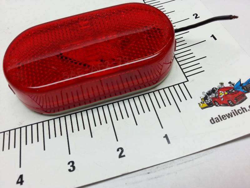 lot 8943-2 image: New Red trailer or truck clearance light assembly.  If youre is broken, dont let this get away.