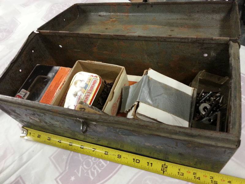 lot 8922 image: Metal tool box about 15 inches long and loaded with concrete nails, sheet rock screws and other handy home