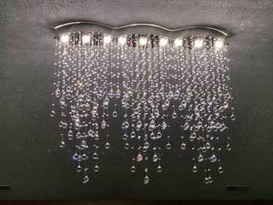lot 1040 image: APBEAM Modern Crystal Raindrop Chandelier Flush Mount Chandelier Crystal Ceiling Light for Dining Room Living Room W8H40