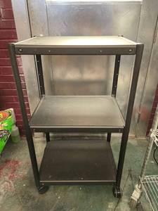 lot 5856 image: Black metal cart with (3) shelves on locking casters