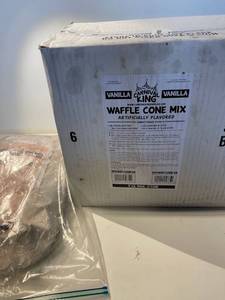 lot 5863 image: Lot of (6) vanilla waffle cone mix. lot of (1) chocolate Waffle cone mix