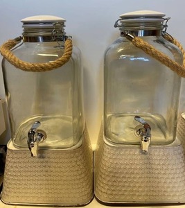 lot 21517 image: lot of (2) 2gallon Glass beverage dispensers with risers
