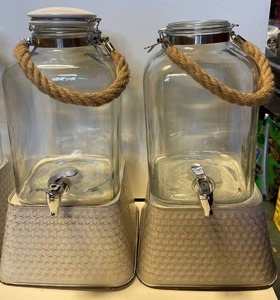 lot 21518 image: lot of (2) 2gallon Glass beverage dispensers with risers