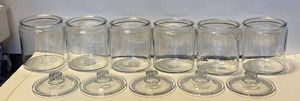 lot 21523 image: Lot of (6) Glass candy jars (5) Glass Lids