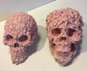 lot 21561 image: lot of (2) cement casted skulls ready to be painted