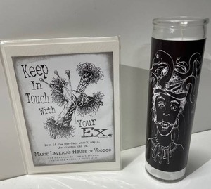 lot 21612 image: Marie Laveau cathedral candle and collectible card