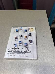 lot 21683 image: Photo clips curtain lights