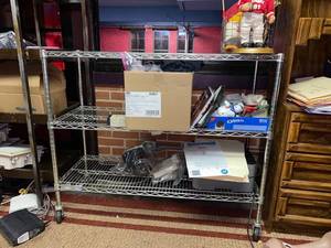 lot 21692 image: Metro shelf with three shelves on wheels
