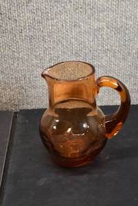 lot 5367 image: Vintage Hand Blown Dark Peach Pitcher WIth Applied Matching Color Handle  5x5