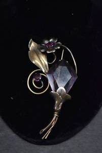lot 1015 image: Flower Brooch  Purple Stones & Gold-toneBrass  12 Karat Stamp  3.5 Brooch