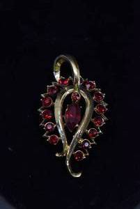 lot 1018 image: Coro Brooch  Red Stones & Gold-tone  2.5 Brooch