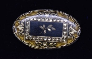 lot 1025 image: Brooch Oval  Silver-tone & White Stones  2 Brooch