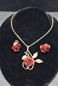 lot 1063 image: Set Metal Roses Gold Tone Necklace and Earrings  Unbranded  Necklace 10 12 long, Earrings 34