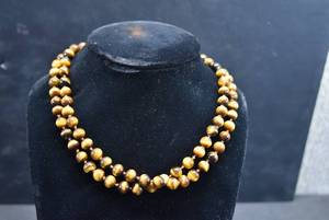 lot 1069 image: Strand of Tigers Eye Beads  16 12