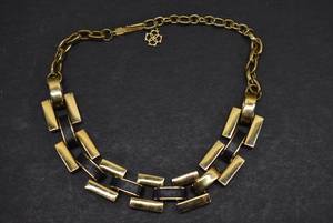 lot 1105 image: Chunky Gold Tone & Faux Leather Necklace