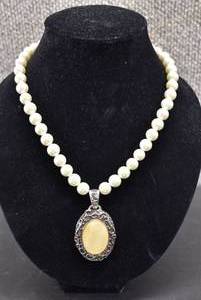 lot 1107 image: George Costume Pearl Necklace & Oval pendant  George  Faux Mother of Pearl & Silver Tone