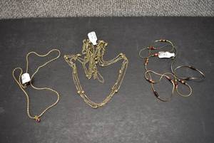 lot 1109 image: Lot of 3 Gold Toned Necklaces