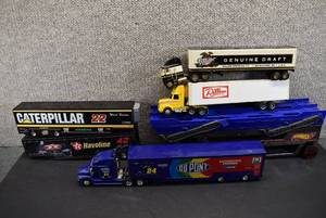 lot 1156 image: Lot of 6 Toy Car Garage & Semi with Race Car Trailers