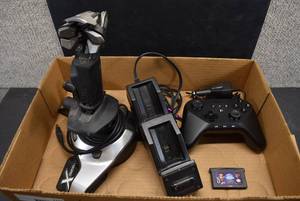 lot 1159 image: Various Gaming Equipment  Amazon Controller, 3DS Car Charger, Gameboy Game, etc.