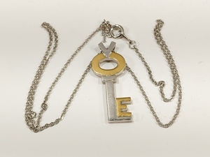 lot 3078 image: VTG Crown Trifari Silver and Gold Tone Necklace LOVE 18 Chain