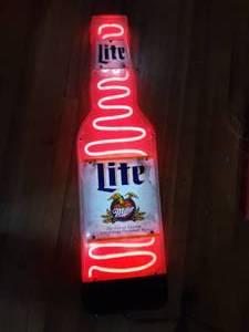 lot 7009 image: Neon Miller Light Beer Bottle Sign  42x12