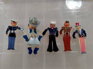 lot 1193 image: Lot of 5 People Pins with Articulating Arms and Legs  Cowgirl, Sailor, Policeman, Etc.