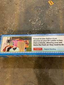lot 1327 image: Extend-a-Line Clothes Dryer - RV