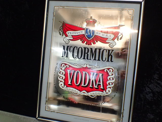 lot 8375 image: McCormick Mirrored Advertisement