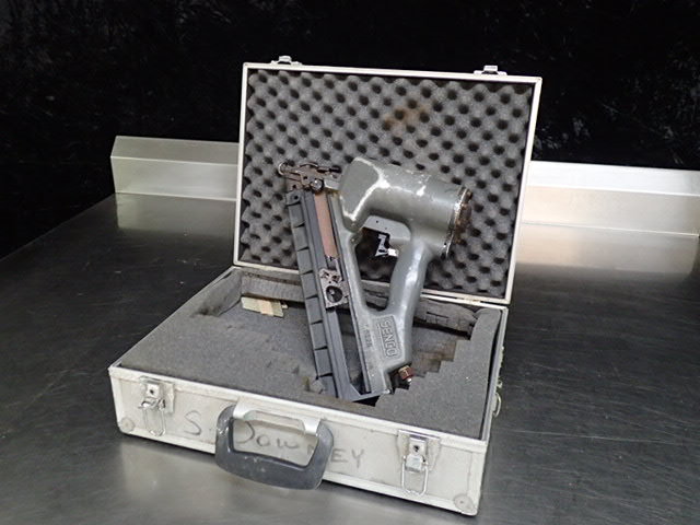 lot 8383 image: Senco Pneumatic Nail Gun
