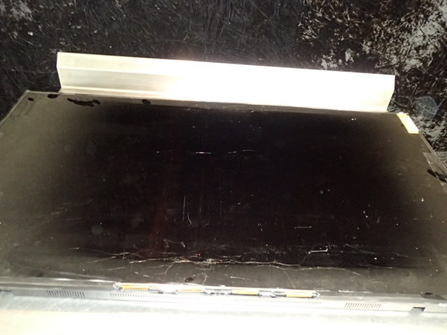 lot 9203 image: Samsung UN75J6300AF 75 Flat Screen with Cracked Screen