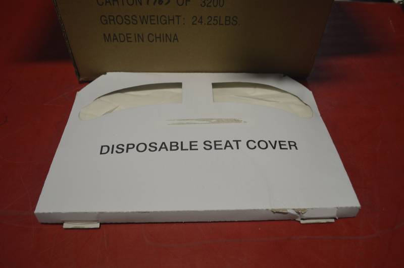 lot 2093 image: BOX OF TOILET SEAT COVERS