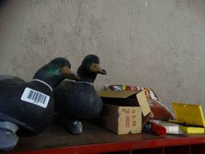lot 1009 image: Misc Contents on top of Metal Cabinet  Decoys - Refrigerant - Misc