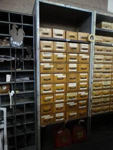 lot 1027 image: 7ft Tall Metal Shelf with wood Drawers