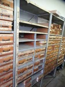 lot 1033 image: 7ft Tall Metal Shelf with wood Drawers