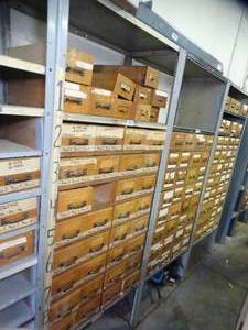 lot 1034 image: 7ft Tall Metal Shelf with wood Drawers