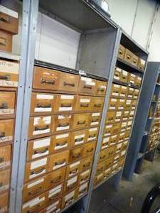 lot 1036 image: 7ft Tall Metal Shelf with wood Drawers