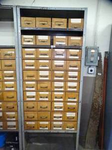 lot 1038 image: 7ft Tall Metal Shelf with wood Drawers