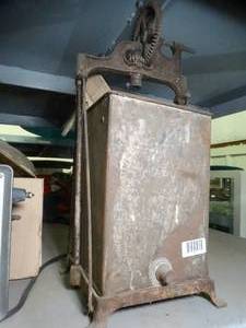 lot 1121 image: Antique Dazey Churn and mfg