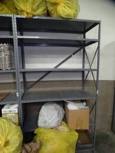 lot 1611 image: BLD 4 W - 7ftx4ft metal rack or shelving contents not included- bolted together...  must be picked up on the last day of load out