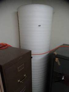 lot 1668 image: 7Ft Tall - Giant roll of packing foam