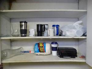 lot 1703 image: Contents in top Cabinet in Breakroom