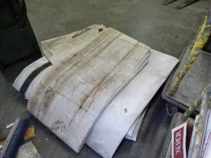 lot 1787 image: Pallet w a Few Bill-Board Canvases