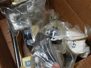 lot 1825 image: Box of New Machine Parts