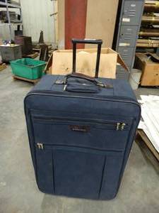 lot 1835 image: Seasonal Decor and Large Suitcase